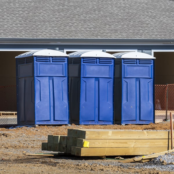 what is the cost difference between standard and deluxe portable restroom rentals in Charleston MO